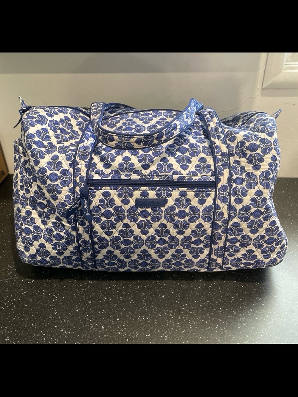 Vera Bradley, quilted blue and white print duffel bag